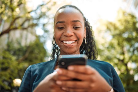 Photo for Smartphone, black woman typing outdoor with social media and chat online, communication and technology. Internet connection, text message or email with closeup, female person and mobile app in nature. - Royalty Free Image