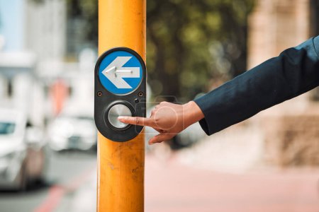 Photo for Woman, hands and arrow button on road in city for pedestrian crossing signal in safe travel outdoors. Female person touching sign, symbol or crosswalk by robot for safety on street in Cape Town. - Royalty Free Image