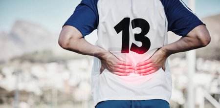Photo for Back pain, red and hands of sports person or football player in graphic overlay for running or cardio injury outdoor. Workout, fitness and soccer people with training, spine risk or medical emergency. - Royalty Free Image
