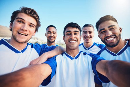 Photo for Soccer player men, team selfie and field for social media post, memory and smile with friends at training. Football group, happy and photography for profile picture, sports and diversity in sunshine. - Royalty Free Image