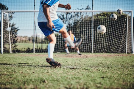 Photo for Sports, training and football player score a goal for challenge at a game or match at tournament. Fitness, exercise and back of soccer athlete kicking a ball at practice on outdoor field at stadium - Royalty Free Image