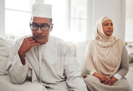 Photo for Muslim couple, fight or mature man with depression, problem or divorce conflict in home living room. Sad, crisis or marriage fail for thinking Islamic people in house stress, mental health or anxiety. - Royalty Free Image