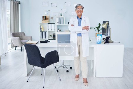 Photo for Happy senior woman, doctor and arms crossed in confidence of healthcare consultant at the office. Portrait of confident and mature female person or medical professional ready for health consultation. - Royalty Free Image