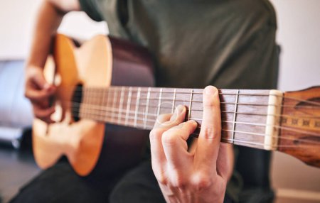 Photo for Hands, person and guitar for music, talent and skills in home studio. Closeup, musician and singer playing acoustic instrument for audio performance, artist and learning notes for sound production. - Royalty Free Image