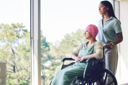 Photo for Senior woman cancer, wheelchair or daughter by window while thinking of treatment, healthcare and medical support. Elderly person with a disability, patient or caregiver help in home with future idea. - Royalty Free Image