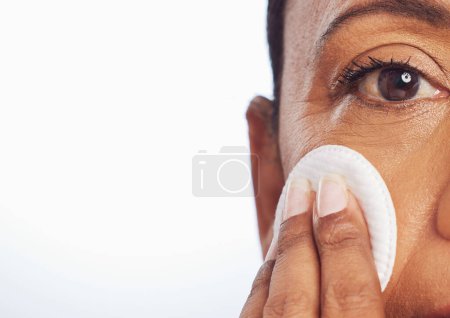 Photo for Portrait, mockup or woman with cotton pad for facial dermatology, skincare or healthy shine. White background, studio space or face of person cleaning with swab for beauty, cleansing or dirt removal. - Royalty Free Image