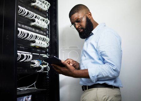 Photo for Data center, tablet and serious technician man with cables for internet connection for software programming. Engineer black person with tech for cybersecurity, wire or problem solving in server room. - Royalty Free Image