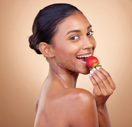Photo for Eating, strawberry and portrait of woman for skincare, natural beauty or benefits from healthy nutrition, diet and fruit. Girl, food and vitamin c for skin to glow, shine or wellness of body. - Royalty Free Image