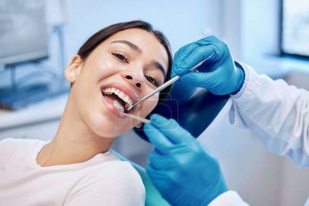 Photo for Healthcare, dentist tools and portrait of woman for teeth whitening, service and dental care. Medical consulting, dentistry and orthodontist with patient for oral hygiene, wellness and cleaning. - Royalty Free Image
