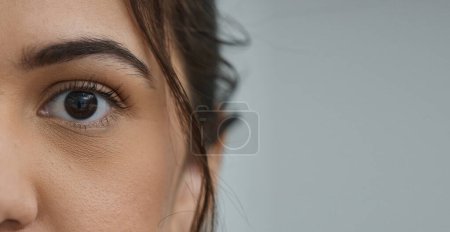 Photo for Woman, eye and zoom in portrait by space, mockup or health for vision, contact lens or biometric test. Girl, model and closeup for cybersecurity banner, retina or cornea scan for safety by background. - Royalty Free Image