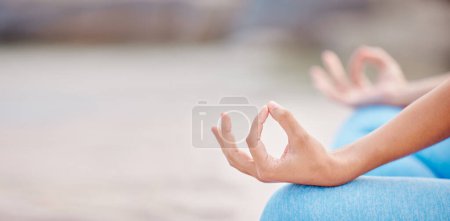 Woman, hands and yoga on mockup for meditation, spiritual wellness or outdoor zen workout in fitness. Closeup of calm female person in relax on beach for mindfulness, awareness or inner peace.