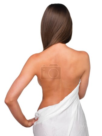Photo for Behind beauty. Rearview shot of a beautiful young woman wrapped in a blanket - Royalty Free Image