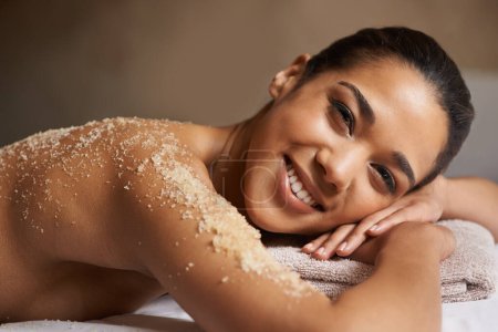 Photo for Portrait of happy girl, body scrub or massage to relax for zen resting or wellness physical therapy in spa. Smile, face or female client in salon to exfoliate for luxury skincare treatment or beauty. - Royalty Free Image