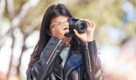 Photo for Photography camera, shooting and city woman, tourist or photographer with creative memory picture, photoshoot or production. Lens, urban street and outdoor person with DSLR for artistic vision shot. - Royalty Free Image