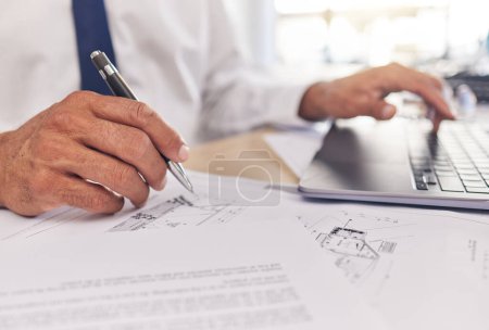 Photo for Closeup of hand, paperwork and architect, blueprint and laptop with writing, contractor and building design. Construction documents, architecture and person with floor plan, tech and notes with pen. - Royalty Free Image