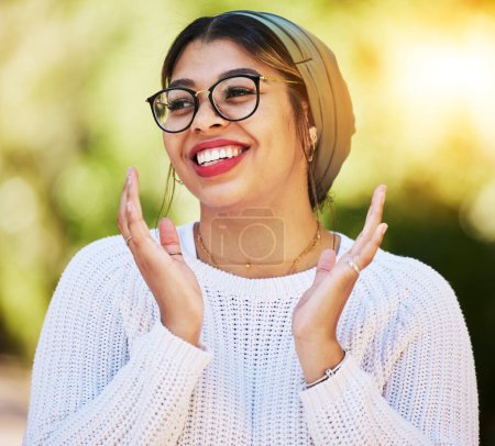 Photo for Young woman, smile and happy face outdoor in nature with glasses and freedom in summer. Fashion, style and gen z female model or student with a turban scarf, happiness and positive mindset at park. - Royalty Free Image