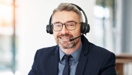 Photo for Call center, portrait and senior man with CRM and contact us, headset for communication and professional headshot. Telecom, customer service and male consultant with help desk employee and mic. - Royalty Free Image