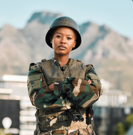 Photo for Soldier, portrait and black woman with arms crossed in city for power, confidence and mindset outdoors. War, combat and face of female warrior proud, hero and ready for army, protection or training. - Royalty Free Image