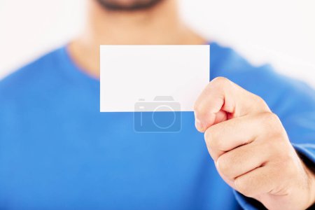 Photo for Mockup, business card and hands in studio for advertising, branding about us or information sign. Closeup of person show space on paper for promotion, contact note or announcement on white background. - Royalty Free Image