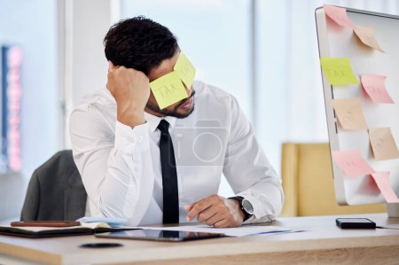 Photo for Tax, problem and business man with sticky note in office for debt, audit or financial crisis on computer. Stress, tired or professional with burnout for mistake, fail or bankruptcy, bills or reminder. - Royalty Free Image