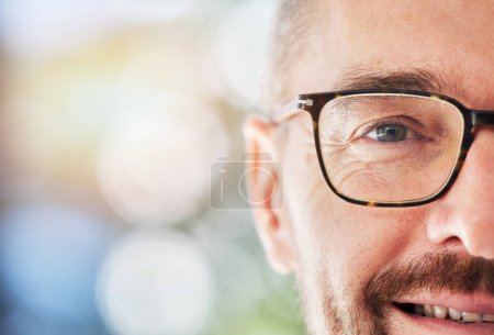 Photo for Half face, portrait and man with glasses for vision, eye care or optical wellness with mockup space. Prescription spectacles, smile and mature male model from Canada with a mock up bokeh background - Royalty Free Image