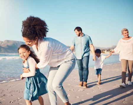 Photo for Happy, child and a mother running at the beach on a family vacation, holiday or adventure in summer. Young girl kid playing with a woman outdoor with fun energy, happiness and love by the ocean. - Royalty Free Image