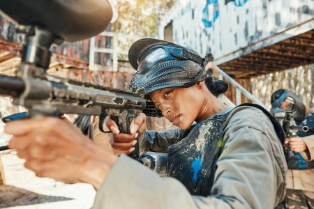 Photo for Paintball gun, focus and woman aim, shooting and target soldier, action warrior or training for battlefield fight conflict. Army mission gear, military practice arena and female shooter in war battle. - Royalty Free Image
