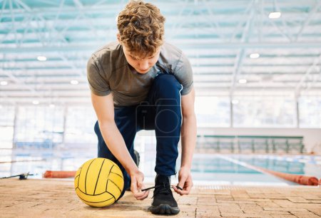 Photo for Shoes, tie and a man water polo coach by a swimming pool in preparation of water sports training in a gym. Fitness, workout and sports with an instructor getting ready for exercise in a health center. - Royalty Free Image