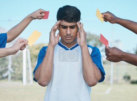 Photo for Hands, card and a man with headache from soccer, fitness stress and warning on the field. Sports, burnout and a frustrated athlete with anxiety during a football game with a referee fail or problem. - Royalty Free Image