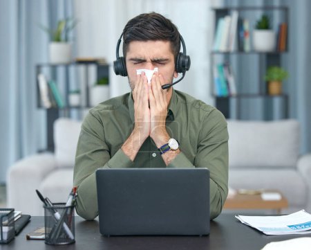 Photo for Sick man, laptop and blowing nose in telemarketing or remote work with tissue at home office. Frustrated male person, consultant agent or freelancer with flu, virus or infection by computer in house. - Royalty Free Image