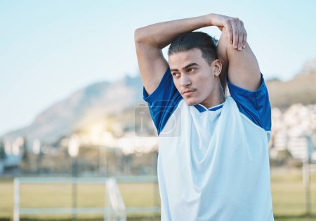 Photo for Thinking, man or soccer player stretching arms on football field in training, exercise or workout in Brazil. Fitness, warm up or male athlete ready to start practice match or sports game in stadium. - Royalty Free Image
