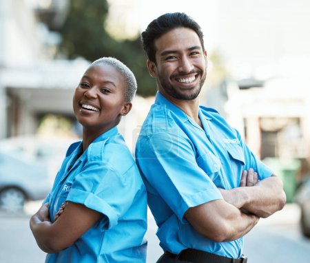 Photo for People, portrait and security guard smile with arms crossed in city for career safety or outdoor protection. Happy man and woman police officer in confidence, law enforcement or patrol in urban town. - Royalty Free Image