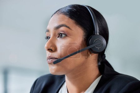 Contact us, call center and business woman face with headset and phone consultation. Crm, telemarketing and web support employee with customer service worker and consultant work in a agency office.