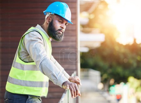 Photo for Construction worker, man thinking and building inspection with industrial employee on a balcony. African male person, professional and builder with vision and safety for engineer project outdoor. - Royalty Free Image