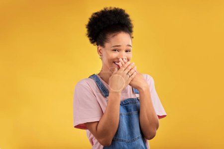 Photo for Laughing, funny and portrait of woman with wow reaction to news isolated in a yellow studio background. Comedy, comic and happy young female person covering mouth due to crazy gossip energy or meme. - Royalty Free Image