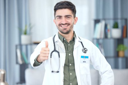 Photo for Thumbs up, portrait and doctor or man in healthcare support, thank you or excellence of hospital services. Medical professional or Saudi Arabia person like, yes and ok hand or emoji in clinic success. - Royalty Free Image