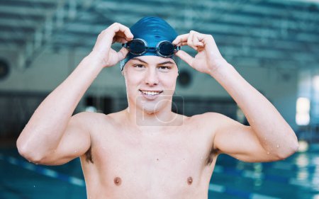 Photo for Happy man, portrait and swimmer in sports training, exercise or workout by the indoor pool. Male person or athlete smile in professional swimming for fitness, water sport or practice in competition. - Royalty Free Image