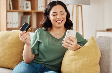 Photo for Phone, credit card and woman on sofa with online shopping and banking at home. Ecommerce, mobile cashback and sale with digital payment on web and easy pay with discount and smile from web checkout. - Royalty Free Image
