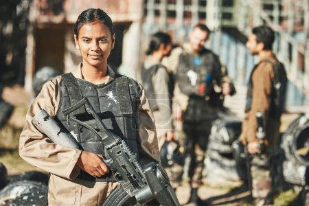 Photo for Woman, portrait and paintball, gun for battle and military training, sports and combat with hero. Fitness, female soldier and war games with warrior, mission and army with challenge and weapon. - Royalty Free Image