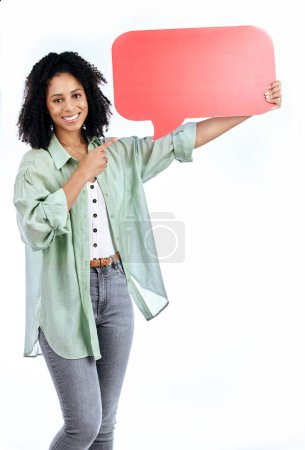 Photo for Woman portrait, smile and hand pointing to speech bubble in studio for social media, contact or info on white background. Happy, face and lady show poster for voice, feedback or FAQ, forum or quote. - Royalty Free Image