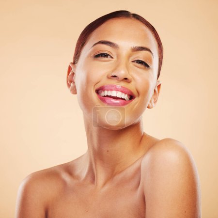 Photo for Portrait, skincare and woman with beauty, cosmetics and happiness against a brown studio background. Face, female person and model with makeup, aesthetic and wellness with health, self care and shine. - Royalty Free Image