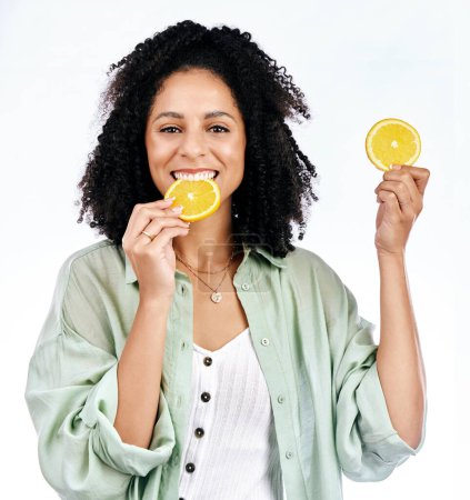 Photo for Portrait, orange and woman with a smile, healthy snack and girl isolated against a white studio background. Face, female person or model with fruit, vitamin c and nutrition with happiness or wellness. - Royalty Free Image