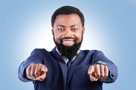 Photo for Business, portrait and black man hand pointing in studio for hiring, recruitment or opportunity on blue background. Face, smile and African male person show you, emoji and coming soon or contact us. - Royalty Free Image