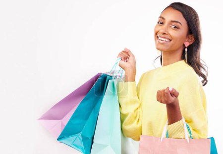 Photo for Fashion, shopping bag and space with portrait of woman in studio for product, boutique and deal. Giveaway, promotion and retail with female customer on white background for mall, mockup or store. - Royalty Free Image