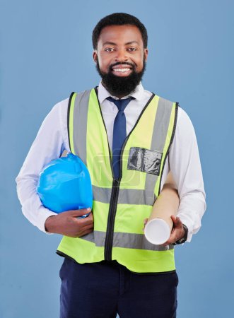 Photo for Happy black man, portrait and construction blueprint in studio for safety inspection, maintenance or architecture. Engineering, contractor and industrial manager with building plan on blue background. - Royalty Free Image