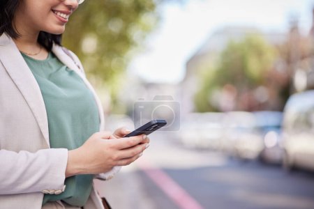 Photo for Outdoor, cellphone and business woman with hands for communication on internet in closeup. Professional female, reading and typing with technology in street for information or social media on app - Royalty Free Image