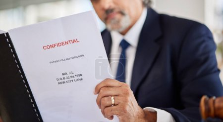 Photo for Lawyer, confidential and paperwork with hands holding patient file and documents in office. Compliance, legal report and attorney employee in a law firm with government contract and policy reading. - Royalty Free Image