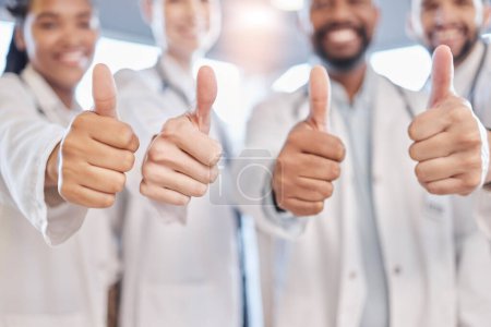 Photo for Thumbs up, hands and hospital doctors, happy people or surgeon team healthcare vote, medical feedback or health agreement. Teamwork support, emoji like icon and wellness clinic group with yes gesture. - Royalty Free Image