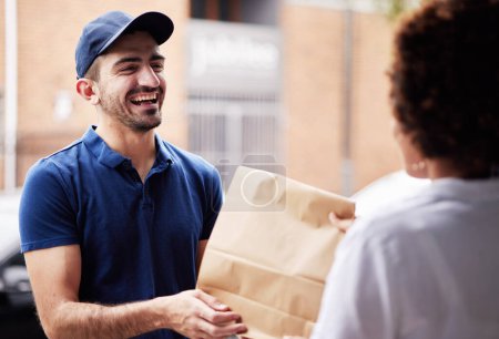 Photo for Happy delivery man, package and a customer at door with a paper bag for e commerce and shipping. Logistics, online shopping and freight or courier worker laughing and giving a woman a fast food order. - Royalty Free Image