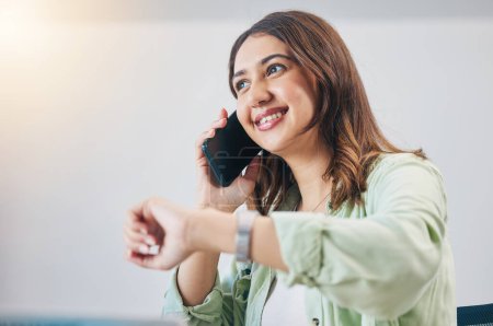 Photo for Phone call, watch and woman checking the time in the office while talking on a cellphone. Happy, smile and young female person on a mobile conversation with technology for a schedule in the workplace. - Royalty Free Image